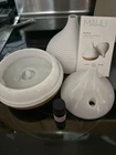 Mahli Danza Ultrasonic Diffuser With 7 Cycling Light Colors Open. Price: $18.00.