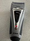 Optimus Curve Rechargeable Triple Wet/dry Men's Shaver, Black/silver Used. Price: $35.00.
