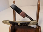 Smith & Wesson SWRD1S Folding Straight Razor With Engraved Handle - New Box. Price: $27.00.