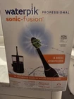 Waterpik Sonic-fusion 2.0 Professional Electric Toothbrush And Flosser In New. Price: $85.00.
