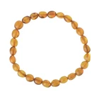 Baltic Amber Adult Bracelet Honey Color- 7.8 Inches Long Elastic Band: New. Price: $46.18.