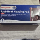 Walgreens Fast-heat Heating Pad Plush, Size 12" 15" Open Box Tested New. Price: $13.00.