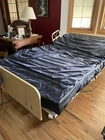 Home Hospital Bed. Adjustable Width. Ultra Low. Medacure. 500 Weight Capacity Used. Price: $1500.00.