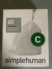 Simplehuman Code Liners, Trash Bags, 10 Liter / 2.6-3.2 Gallon 60 Ct. New. Price: $8.10.
