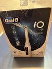 Oral-b Io Series 5 Ultimate White Rechargeable Toothbrush, Open. Price: $64.99.