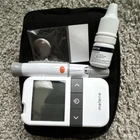 Metene AGM-513S Digital Glucose Monitor Kit W/ Case, Lancing Device, Battery Open. Price: $8.95.