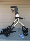 Walk Mate Rollator Pro WM02061 Height-adjustable Seat 10" Wheels Gold Champagne Open. Price: $139.95.