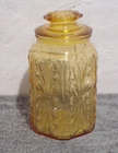 Le Smith Atterbury Scroll Canister W/lid Amber Color With Good Seal Used. Price: $22.50.