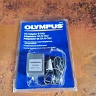 Olympus E-7AU Ac Adapter Power Supply For & Fe Series Cameras Japan(new). Price: $23.99.