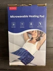 Comfytemp Microwavable Heating Pad K9304 Weighted 12"X23". Box Opened New. Price: $22.95.