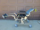 Upgraded- Raz Tilt Mobile Shower Chair Commode Roll Recline Used. Price: $1399.00.