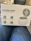 Ultrasonic Cleaner New. Price: $25.00.