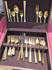 24 Karat Gold Plated Floral Flatware Set Wooden Case Missing One Spoon Used. Price: $75.00.
